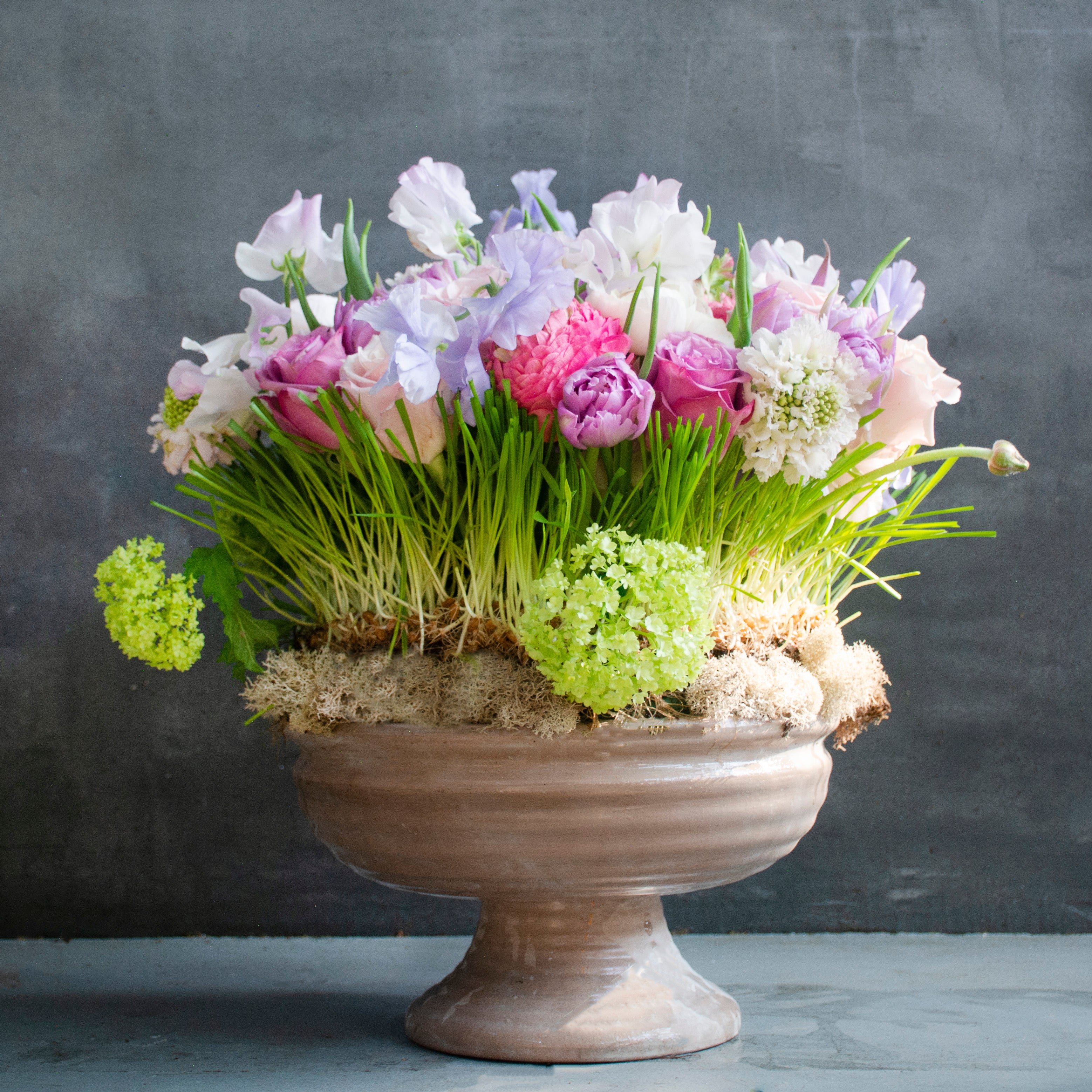 Lavender Flowers in Golden Vase
