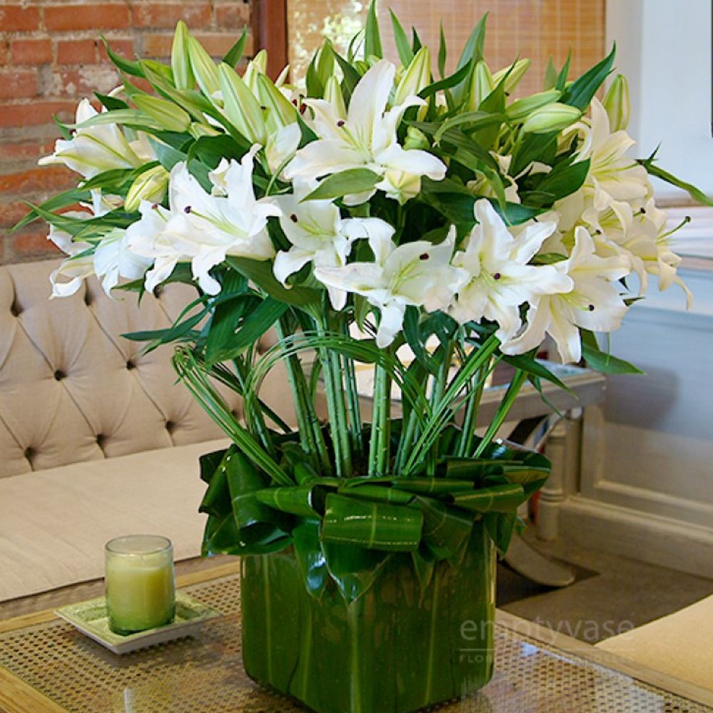 elegance white lily bouquet White Lilies Floral Arrangement - Empty Vase